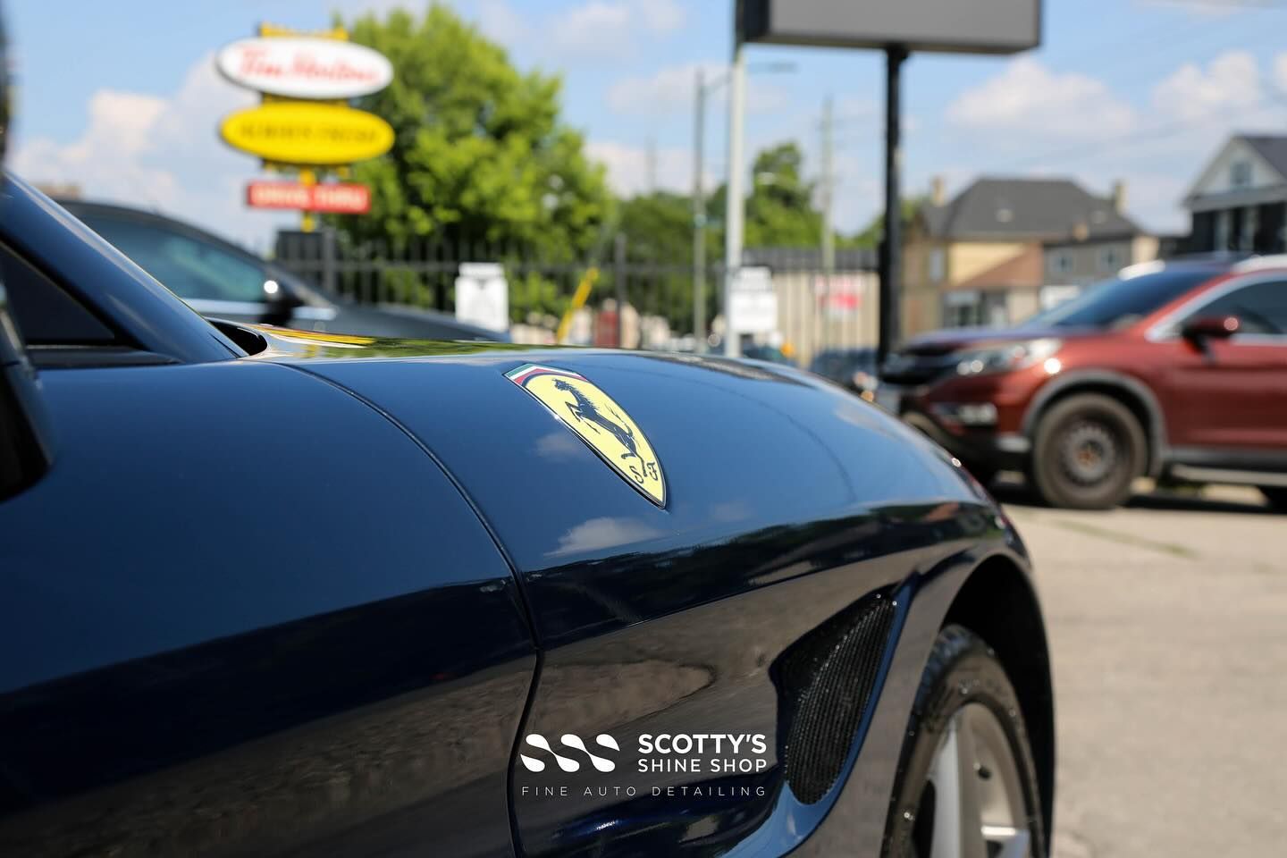 2015 Ferrari California T Xpel Ultimate Plus Paint Protection Film and Ceramic Coating emblem close up London, ON