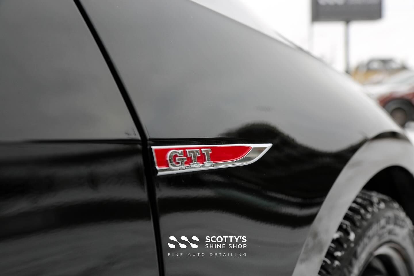 2018 VW Golf GTI Paint Correction, Xpel Fusion Premium Ceramic Coating and Xpel Prime CS Window Tint emblem close up London, ON Canada