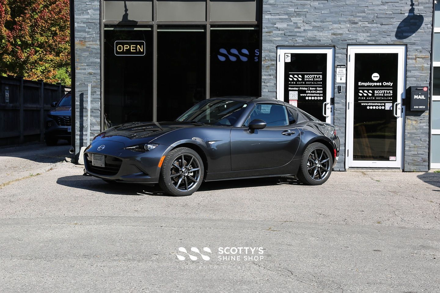 2019 Mazda MX-5 Miata RF in front of Scotty's Shine Shop London