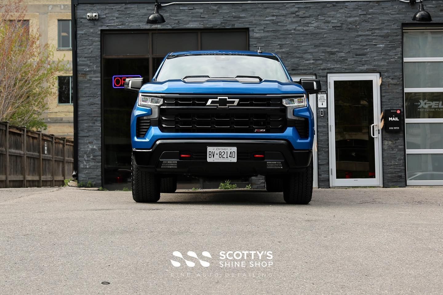 2022 Chevrolet 2022 Chevrolet Silverado Z71 Light Paint Correction, Modesta BC-X Ceramic Paint Coating, Xpel Prime XR Ceramic Window Tint and Gloss Black Badges Replacement front end view London, Ont