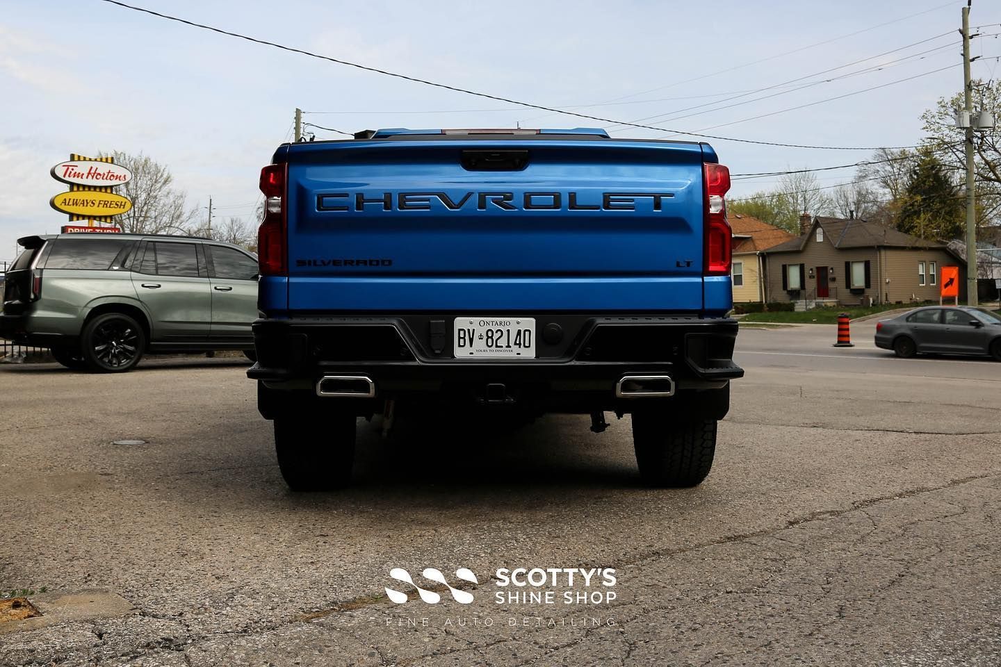 2022 Chevrolet 2022 Chevrolet Silverado Z71 Light Paint Correction, Modesta BC-X Ceramic Paint Coating, Xpel Prime XR Ceramic Window Tint and Gloss Black Badges Replacement rear view London, Ont