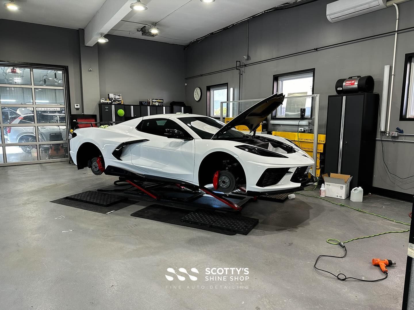 2024 Chevrolet Corvette C8 Full Coverage in Paint Protection Film, Xpel Prime XR Plus Ceramic Window Tint, Ceramic Coating & Colour Change Powder Coated Wheels & Roof Panels hood up side view London, Canada