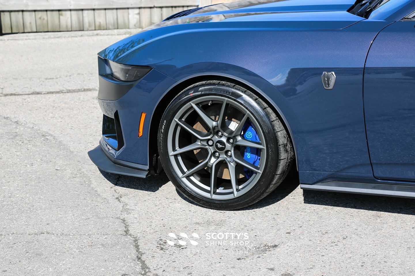 2024 Ford Mustang Dark Horse LLumar Formula 1 Stratos Ceramic Window Tint, SunTek Ultra PPF, Ultrafit Wincrest EVO Windshield Protection Film, Modesta Glass and Wheel Coating front wheel close up London, ON