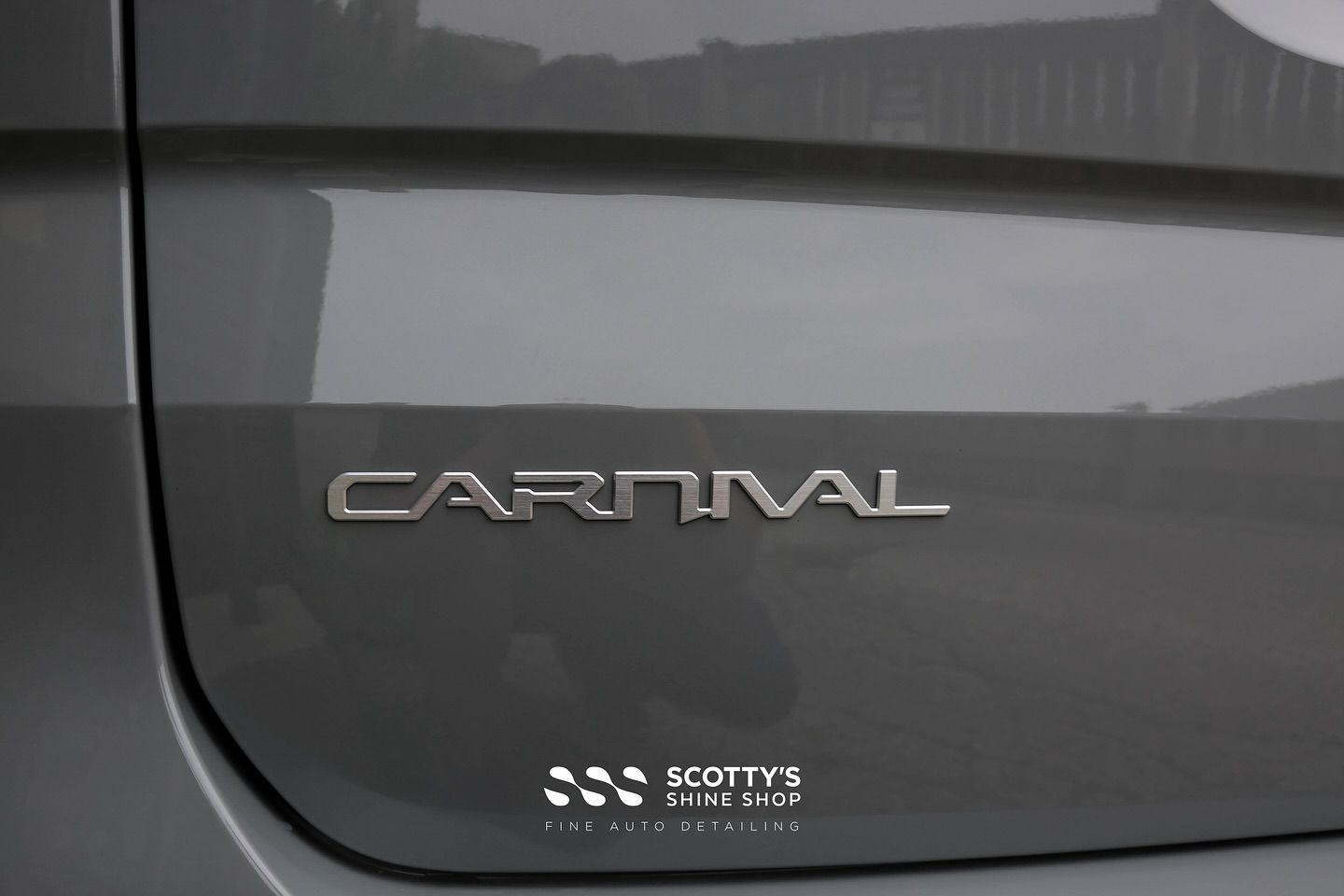 2024 Kia Carnival Paint Protection Film, Ceramic Window Tint and Ceramic Coating emblem close up London, Ontario