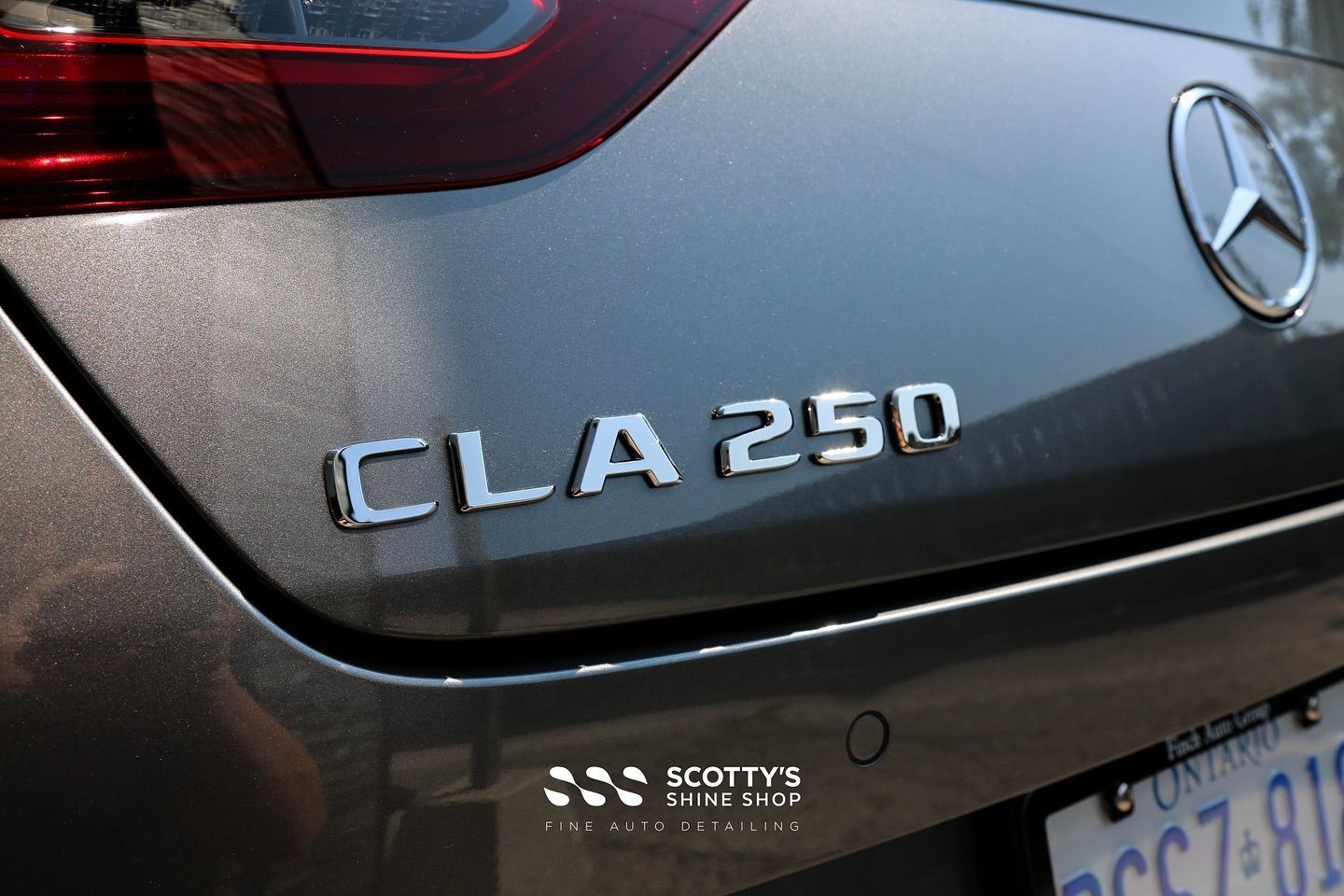 2025 Mercedes CLA250 Paint Correction and Modesta BC-04 Nano-Titanium Glass Coating rear emblem close up London, Ontario