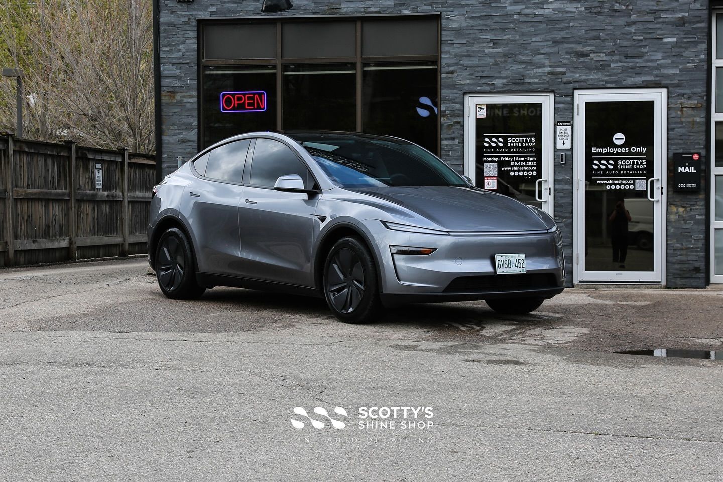 2025 Tesla Model Y SunTek Ultra Paint Protection Film, LLumar Formula 1 Stratos Ceramic Window Tint, Modesta BC-X Ceramic Coating front end view London, Canada