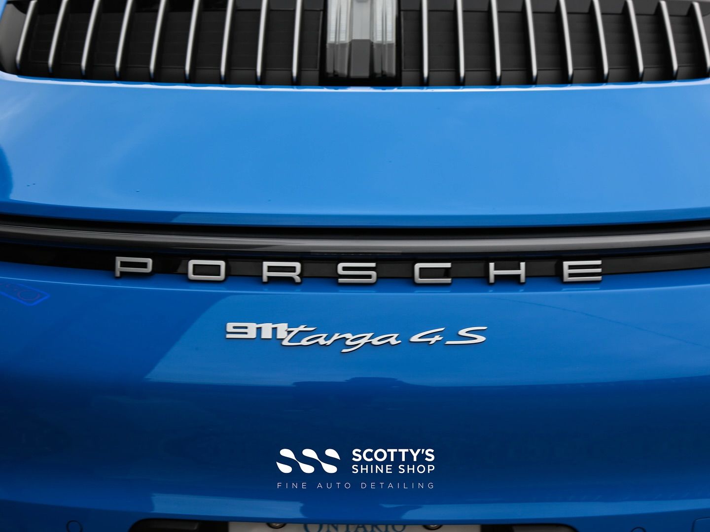 911 Targa4S Premium Suntek Ultra Paint Protection Film Covering the Front End, Pillars, Rocker Panels and Rear Fenders rear emblem close up view London, Ontario