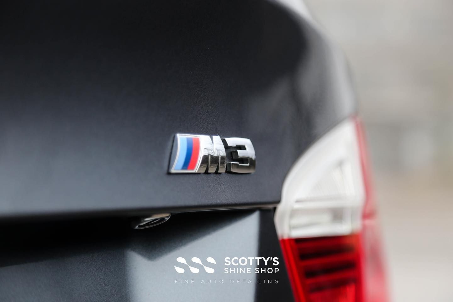BMW M3 Paint Correction and Ceramic Coating emblem close up London, ON