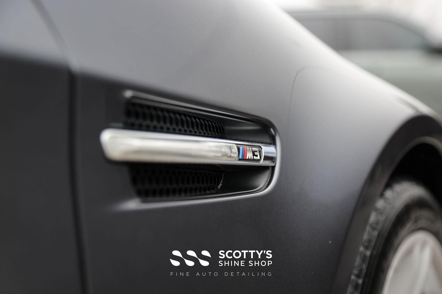 BMW M3 Paint Correction and Ceramic Coating emblem close up London, Ontario