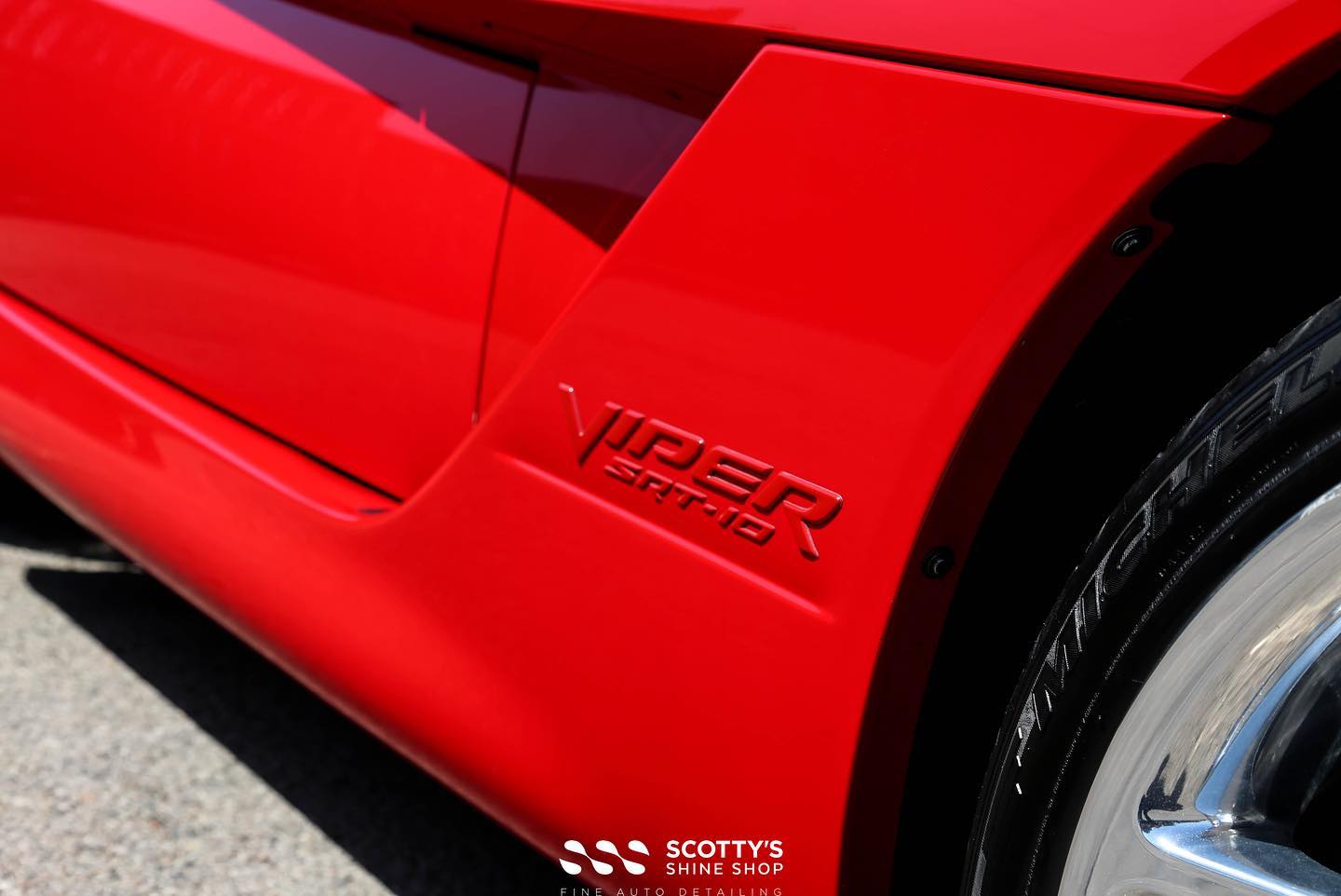 Dodge Viper paint correction and protected with Modesta BC-04 nano titanium glass coating emblem close up London Ontario