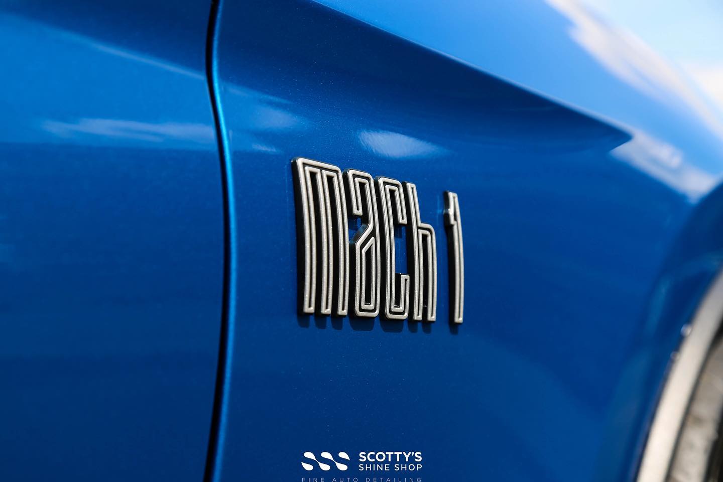 Ford Mustang Mach 1 Xpel XR Plus ceramic window tint and Modesta BC-04 nano titanium glass coating emblem close upLondon Canada