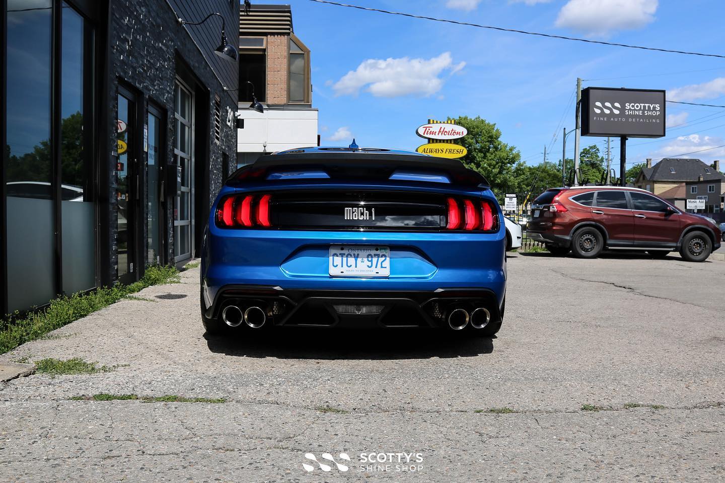 Ford Mustang Mach 1 Xpel XR Plus ceramic window tint and Modesta BC-04 nano titanium glass coating rear view London Canada