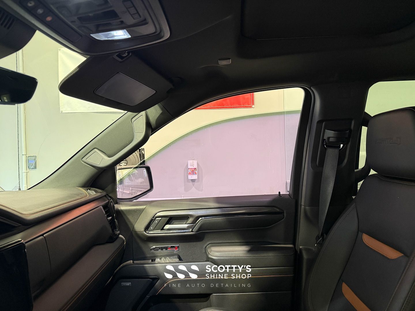 GMC Sierra AT4 Replacement LLumar Formula 1 Window Tint interior detail close up with old window film London, Ontario