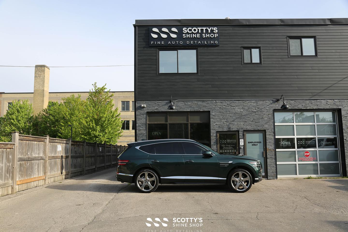 Genesis GV80 at the shop for a full paint correction and protection on the wheels and body with Modesta glass paint coatings!