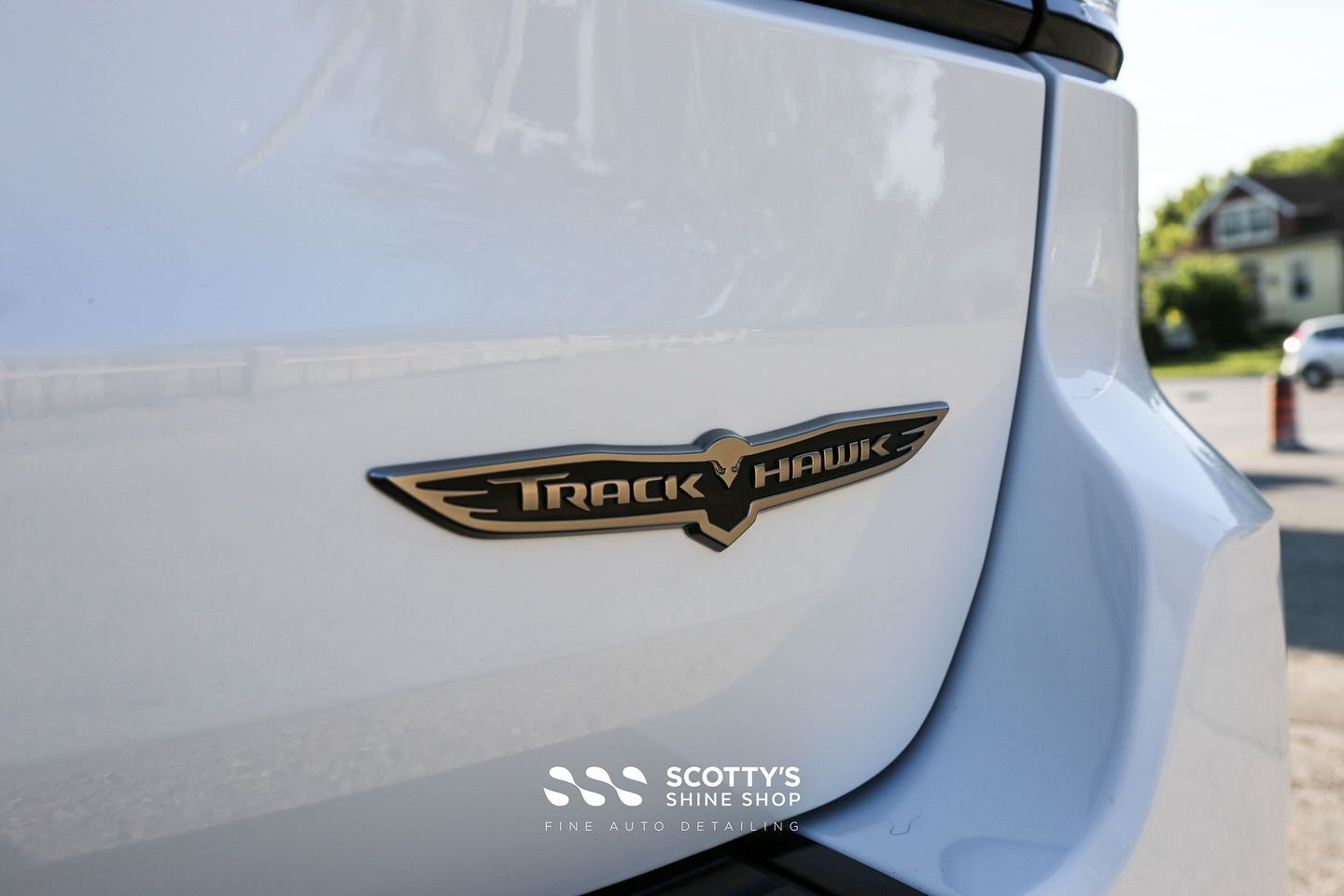 Jeep Grand Cherokee Supercharged Suntek Ultra Paint Protection Film, Light Paint Correction and Modesta BC-04 Nano-Titanium Glass Coating rear emblem close up London, ON