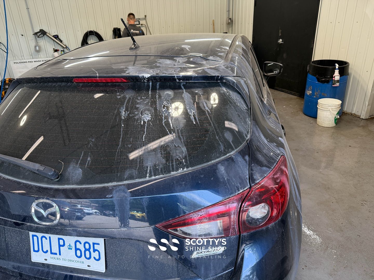 Mazda 3 Light Paint Correction, Mineral Deposit Removal Before and After rear view close up London, ON Canada