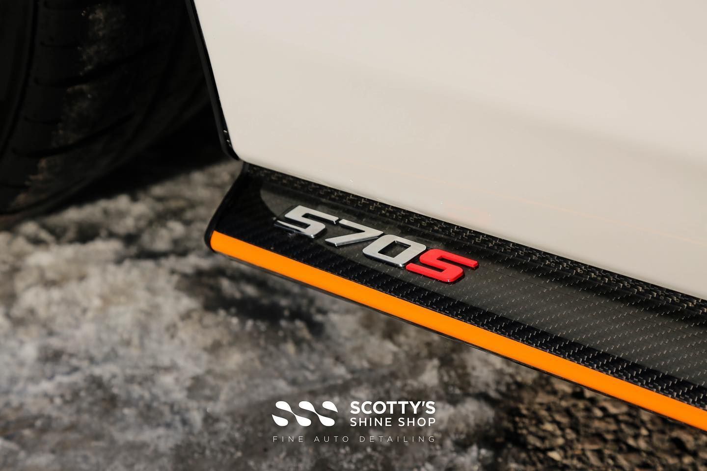 McLaren 570S Xpel Ultimate Plus Paint Protection Film and a Premium Ceramic Coating emblem close up London, ON