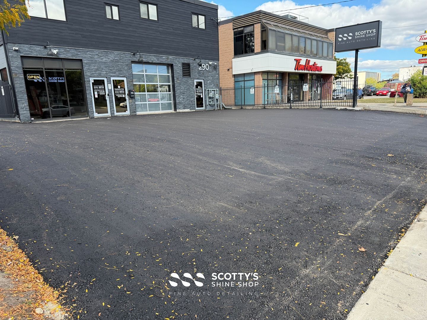 We are finally going to have the beautiful parking lot we needed. Today the first layer of asphalt w