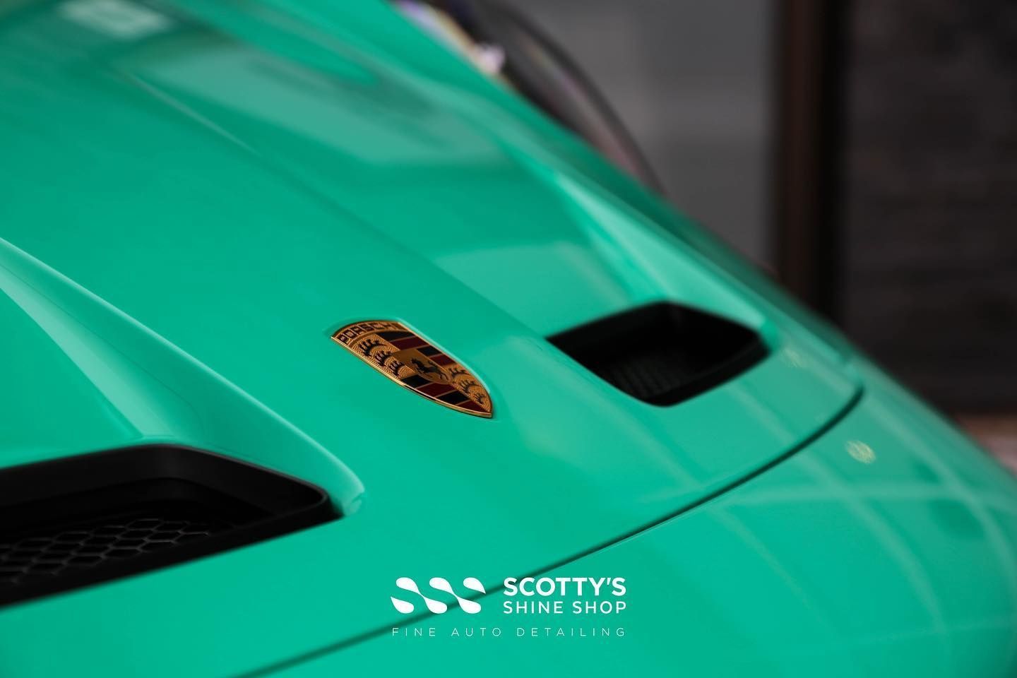 Porsche 911 GT3 Xpel Ultimate Plus Paint Protection Film, Xpel Prime XR Ceramic Window Tint and Gtechniq Crystal Serum Ultra Ceramic Coating hood emblem close up  London, ON