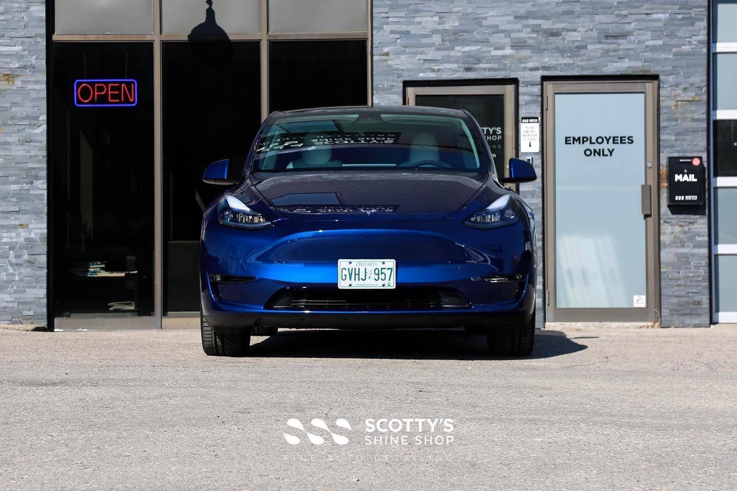 Tesla Model Y Xpel Prime XR Plus Ceramic Window Tint and Xpel Ultimate Plus Paint Protection Film front end view London, Ontario