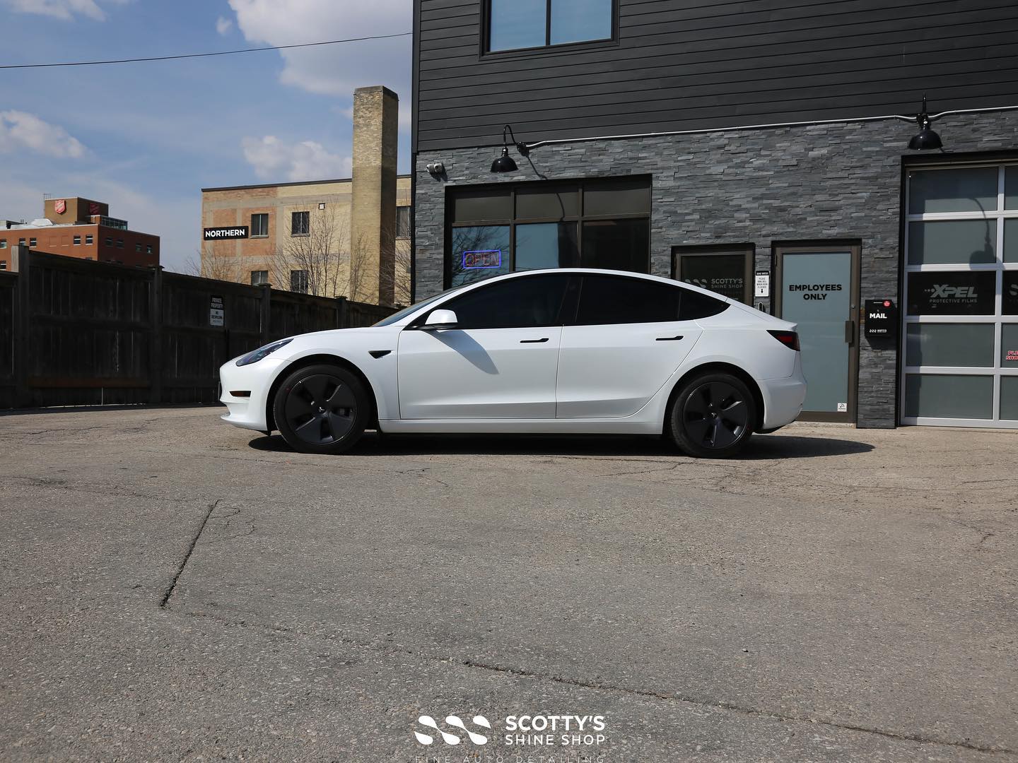 Tesla Model Y Xpel Ultimate Fusion paint protection film side view London Ontario