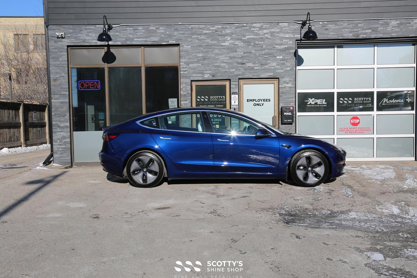 Tesla paint correction and ceramic coating side view - London