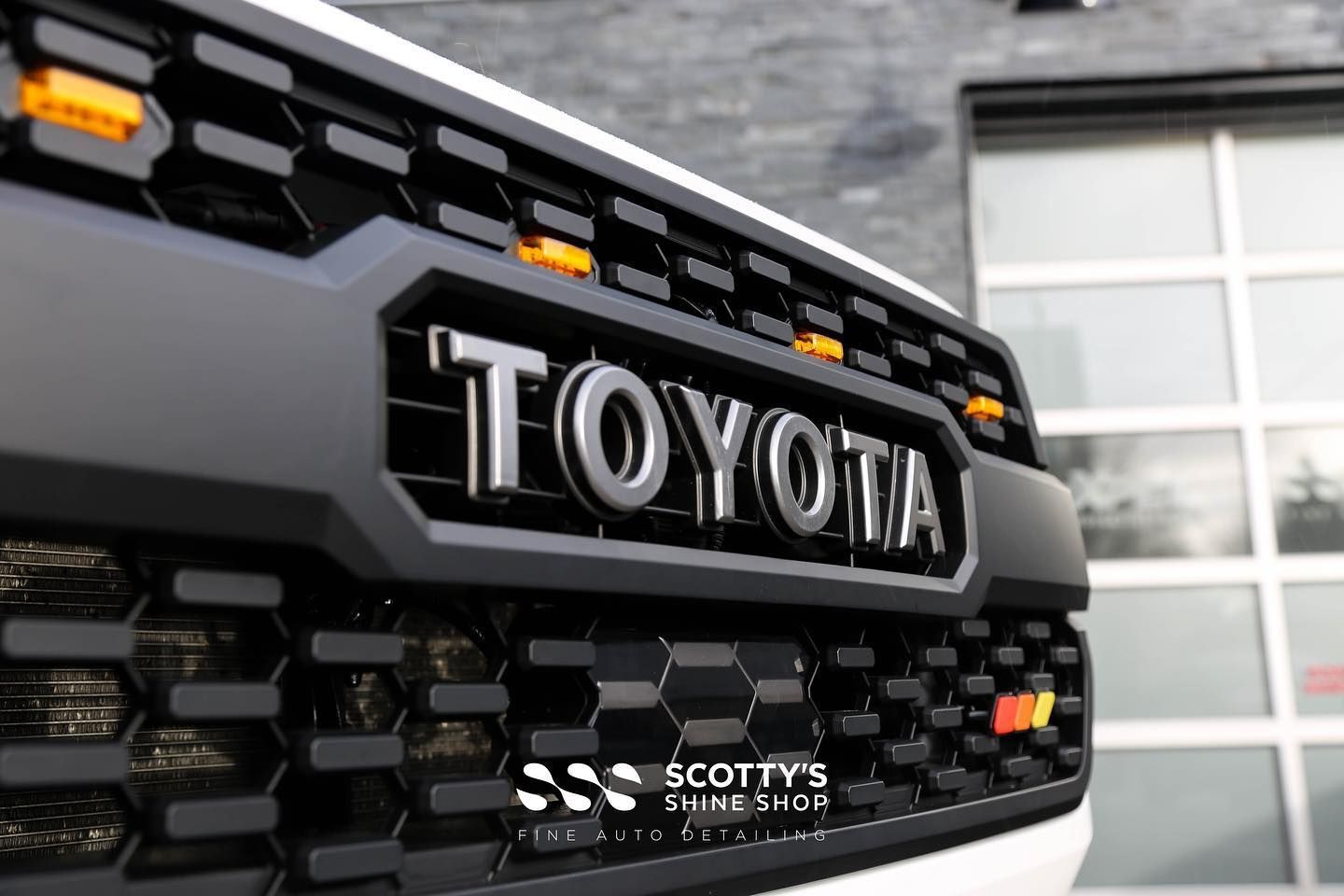 Toyota Tacoma Paint Correction Ceramic Coating front grill close up London, ON