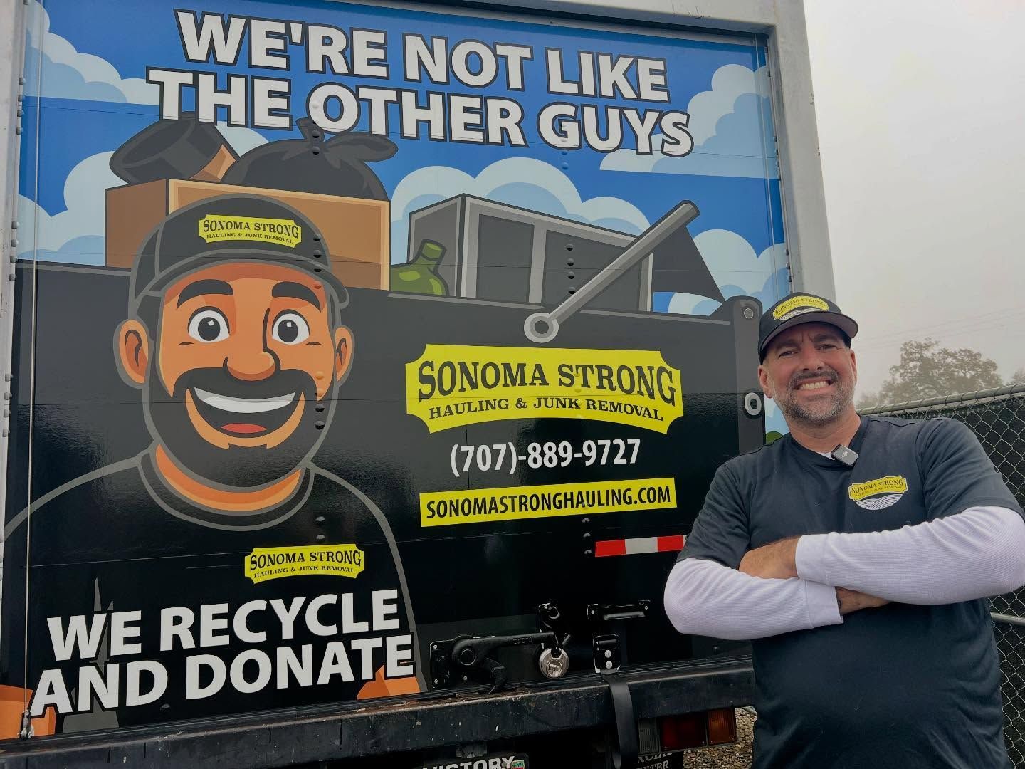 sonoma strong hauling owner standing in front of his new box truck for donation services
