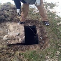 Working at Hole — Septic Tank Contractor in Wythe County, VA