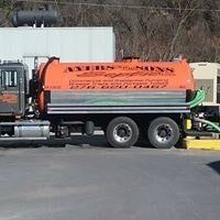 Orange Septic Truck — Septic Tank Contractor in Wythe County, VA