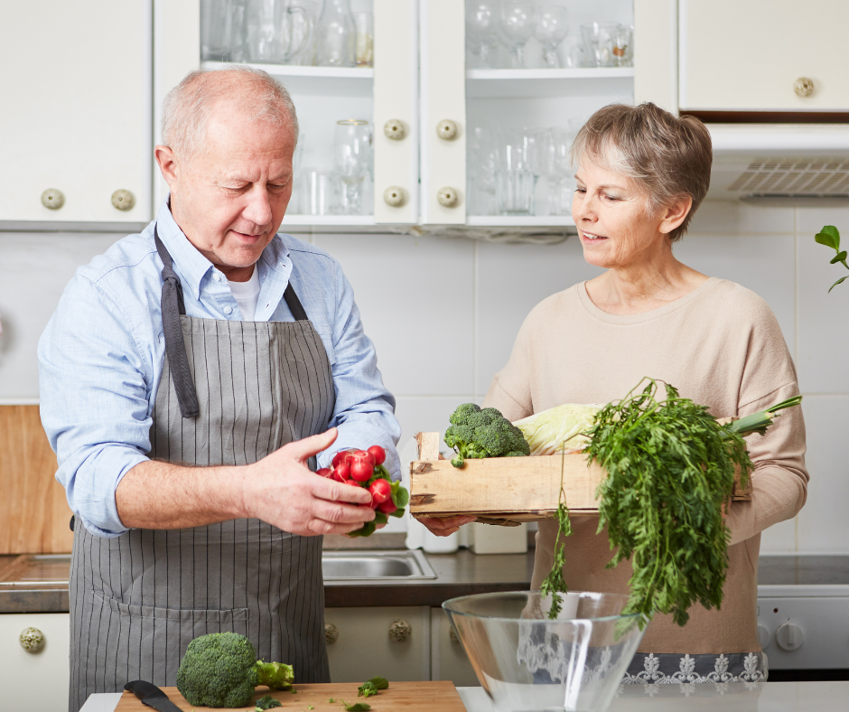 Senior couple preparing fresh food