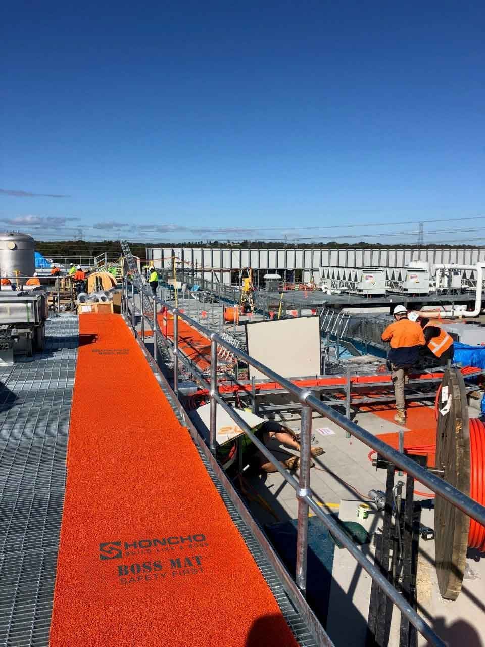 Honcho Boss Mat HD laid over roof areas for worker safety