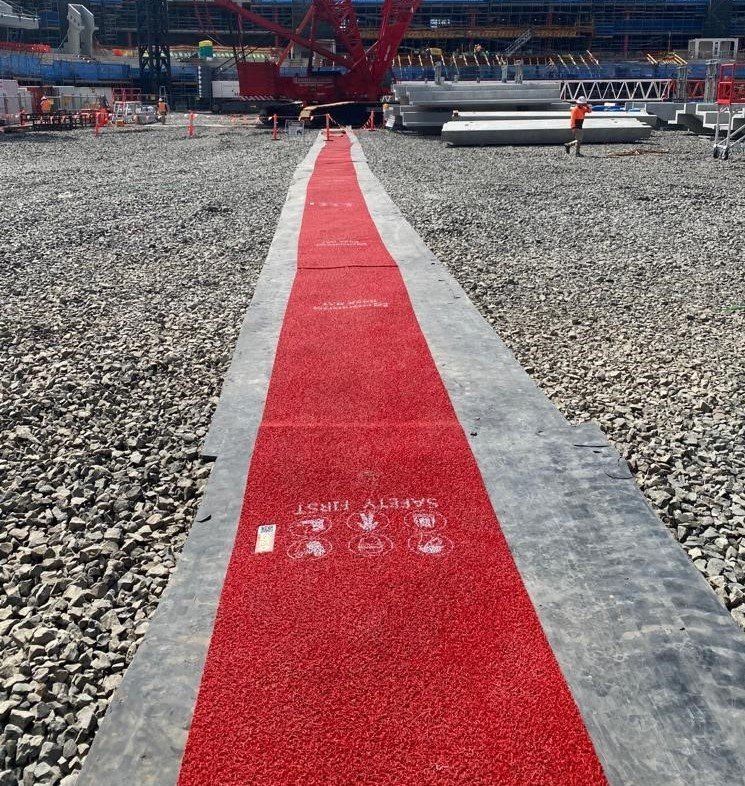 Honcho Boss Mat HD across gravel on Sydney Football Stadium - John Holland