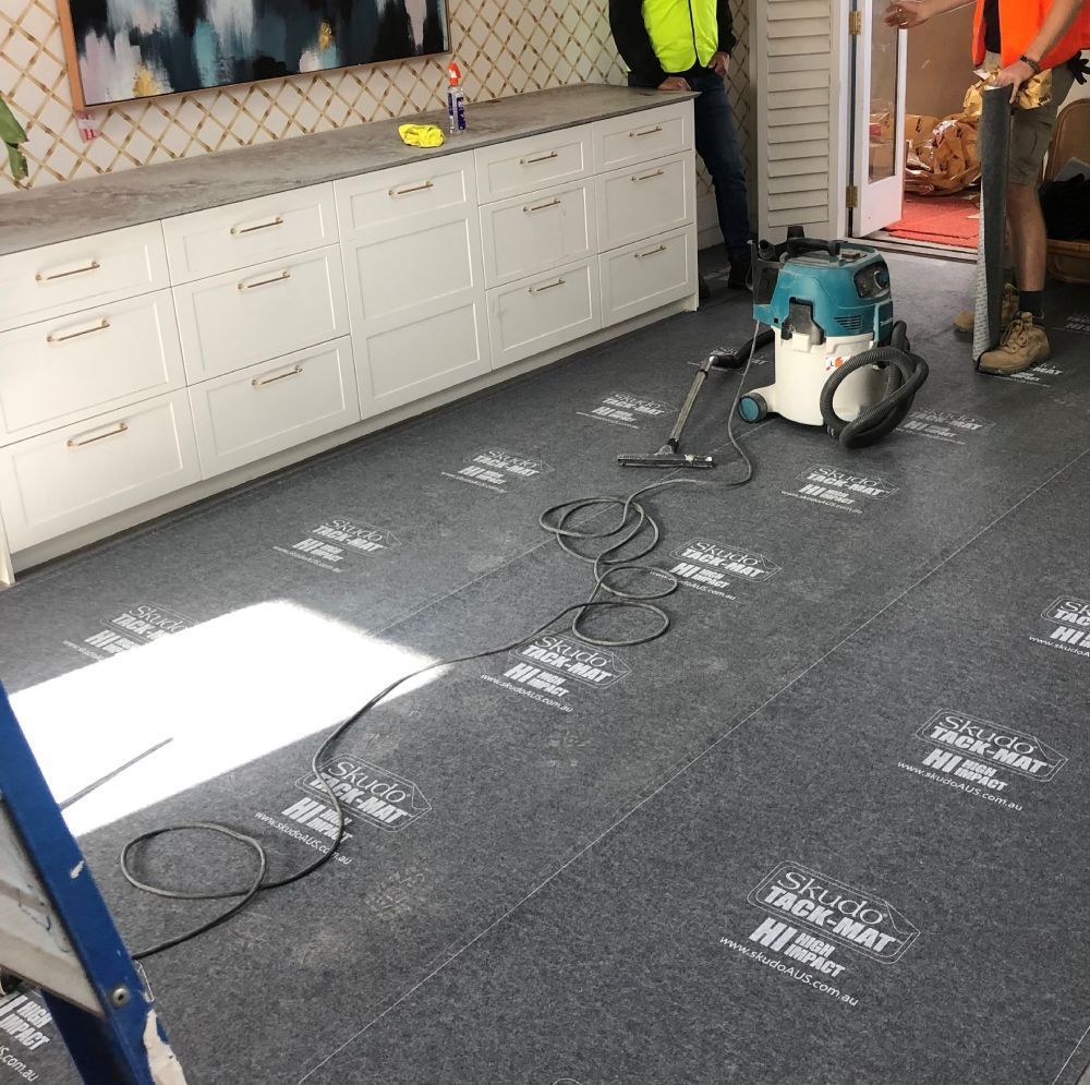 Skudo HI Tack Mat protecting timber floor boards - The Block