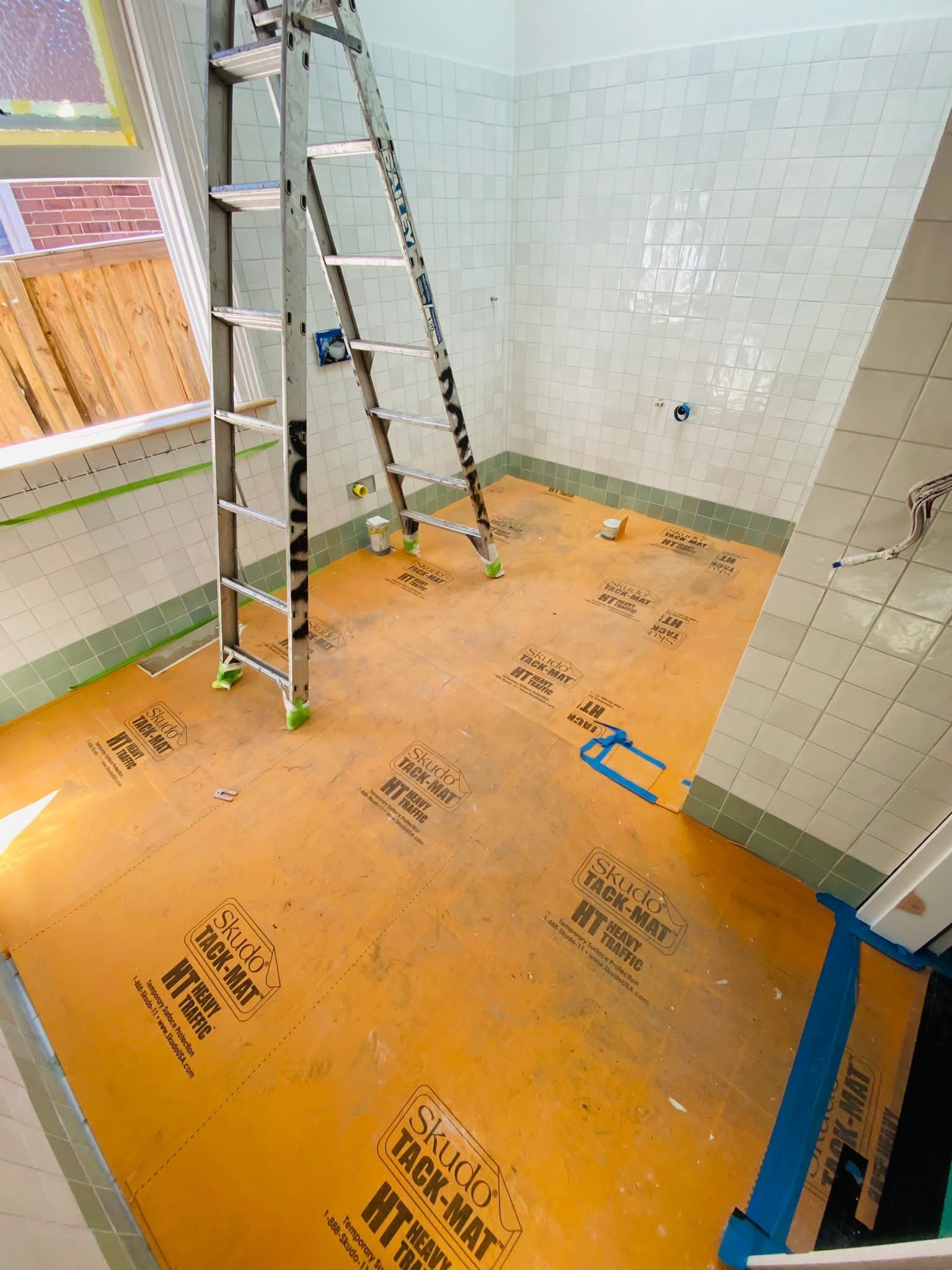 Skudo HT Tack Mat protecting tiles - Zirili Builders