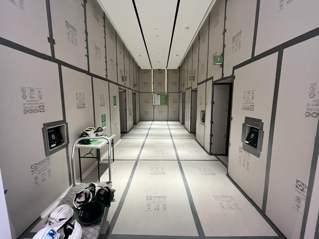 Honcho Chief Board HD protecting a lift lobby for Renascent