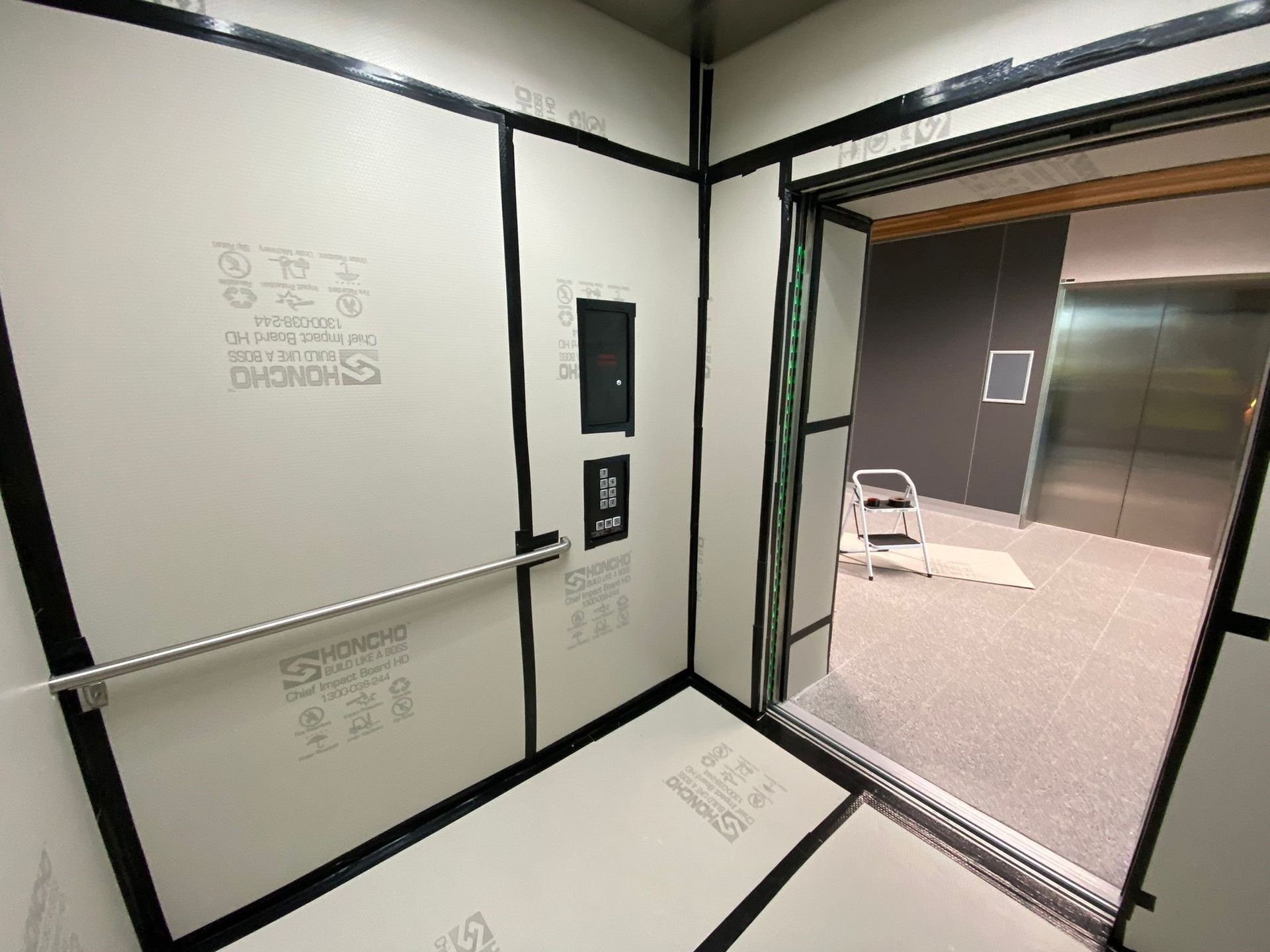 Honcho Chief Board HD protecting a lift interior at Westmead Hospital: ICG - Westmead