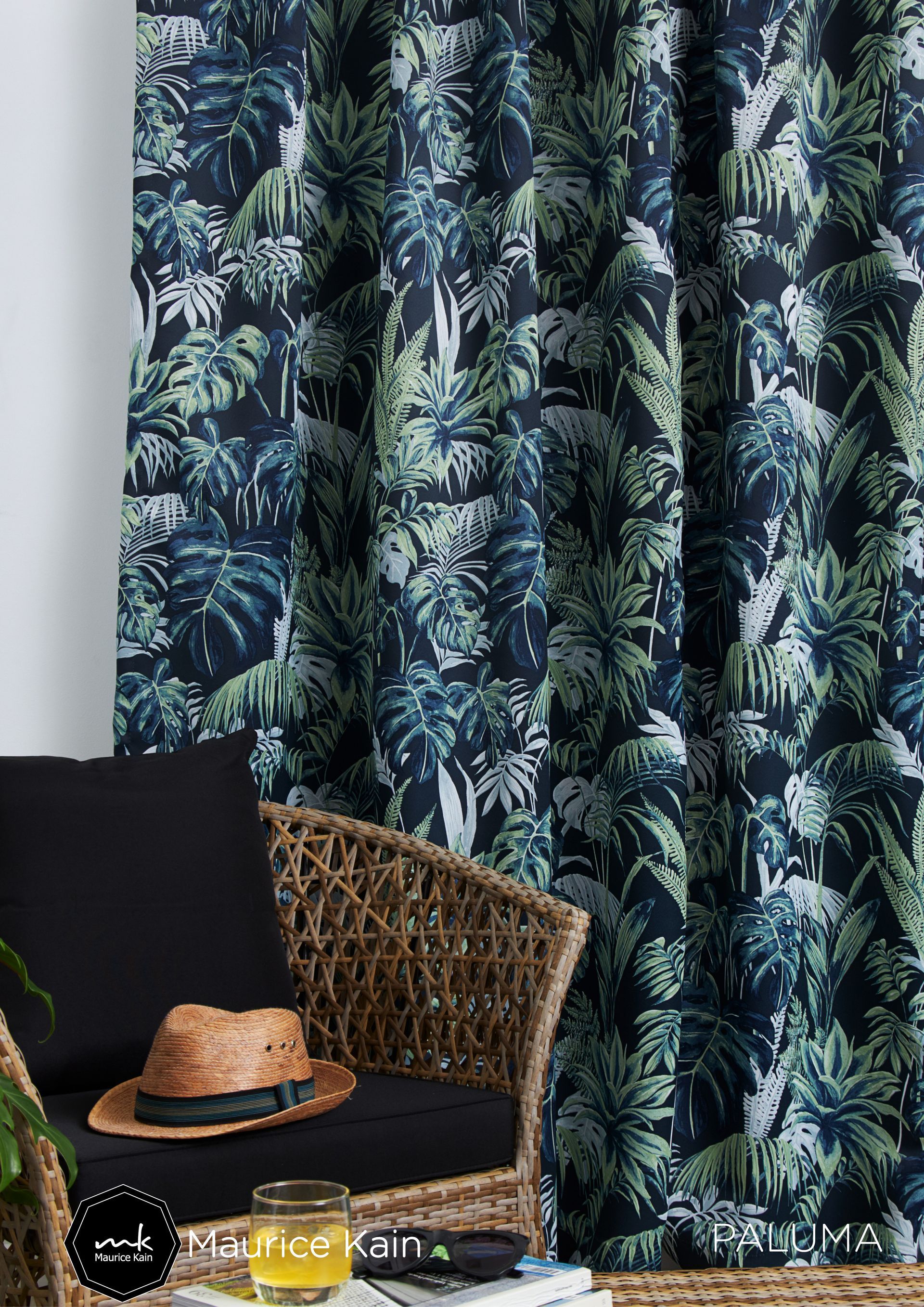 Hand Pulling Back a Beige Curtain in a Light-colored Room — Instyle Curtains & Blinds in Bungalow, QLD