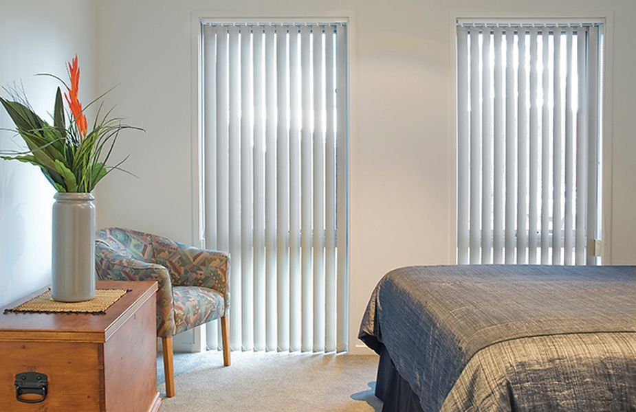 Sunlight Through Blinds Casts Shadows on a Wood Floor — Instyle Curtains & Blinds in Bungalow, QLD