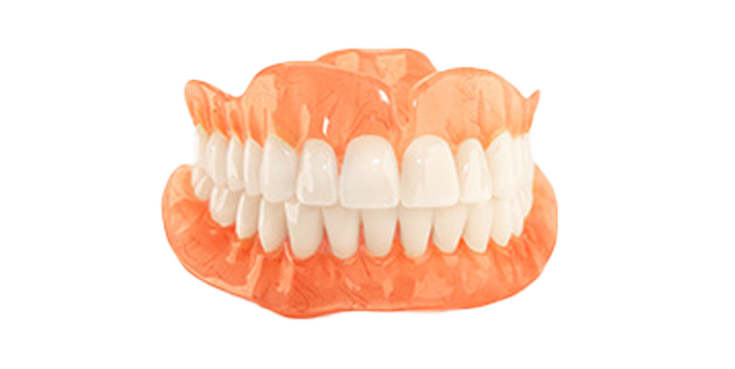 A close up of a denture with white teeth on a white background.