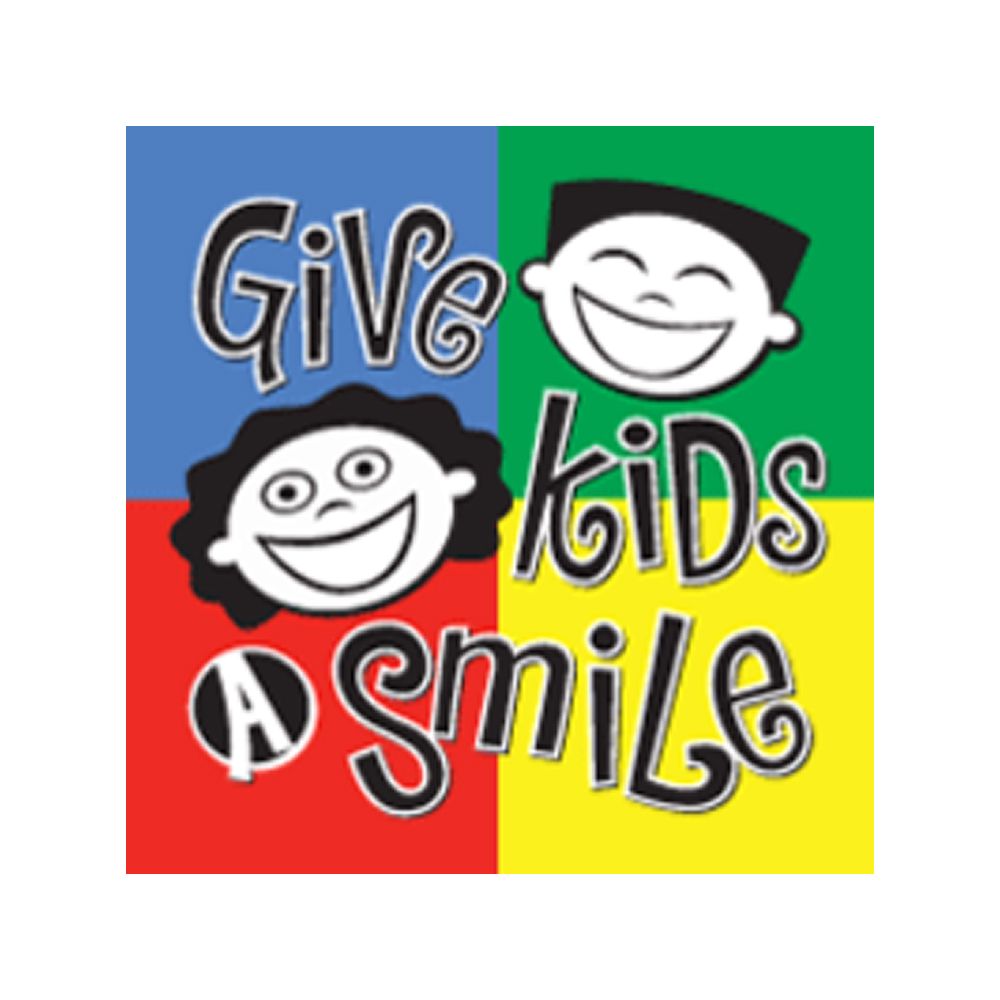 A colorful sign that says give kids a smile