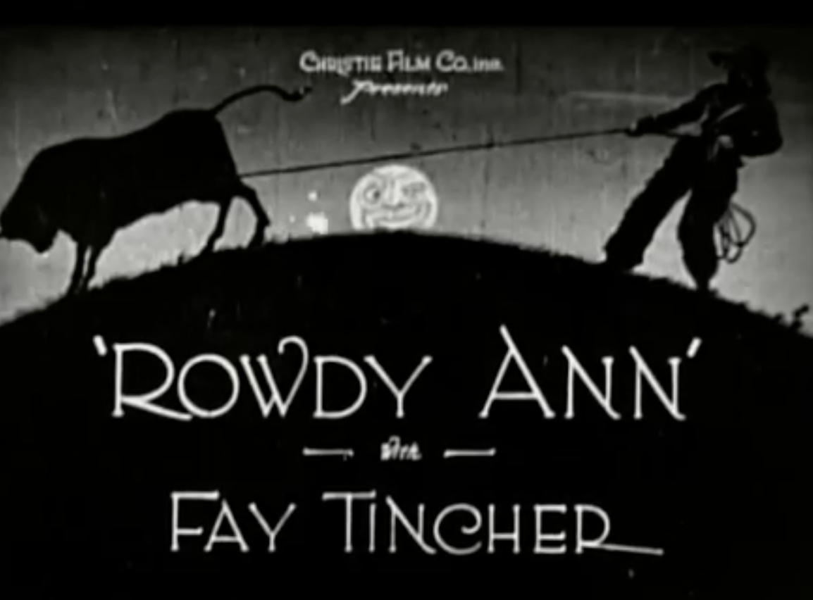 Silent-film title card for “Rowdy Ann” by Fay Tincher, with a cowboy, bull, and silhouetted rider on a hill.
