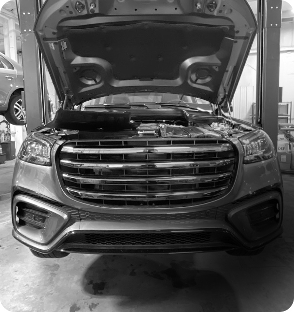 car with hood up | Benz Tech