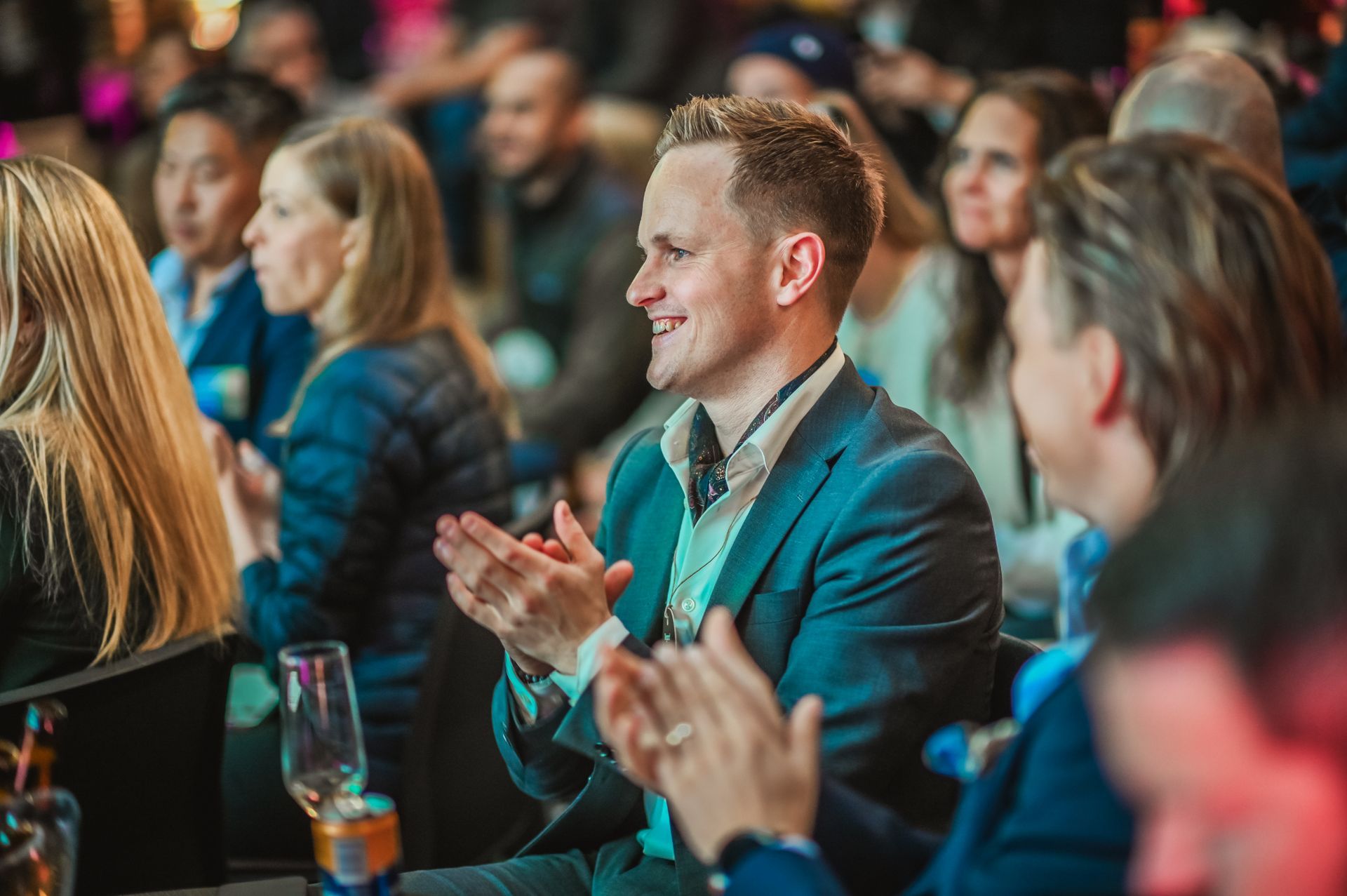 Man presenting to a screen displaying 