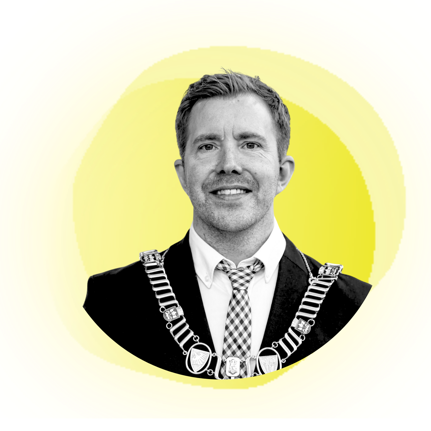 Smiling woman with dark, curly hair in front of a coral background.