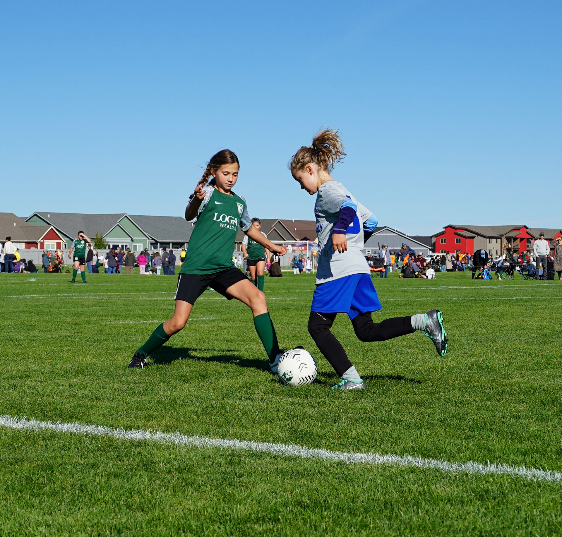Kids enjoying the game in Flathead Valley United programs, developing skills and teamwork in a fun, supportive environment.