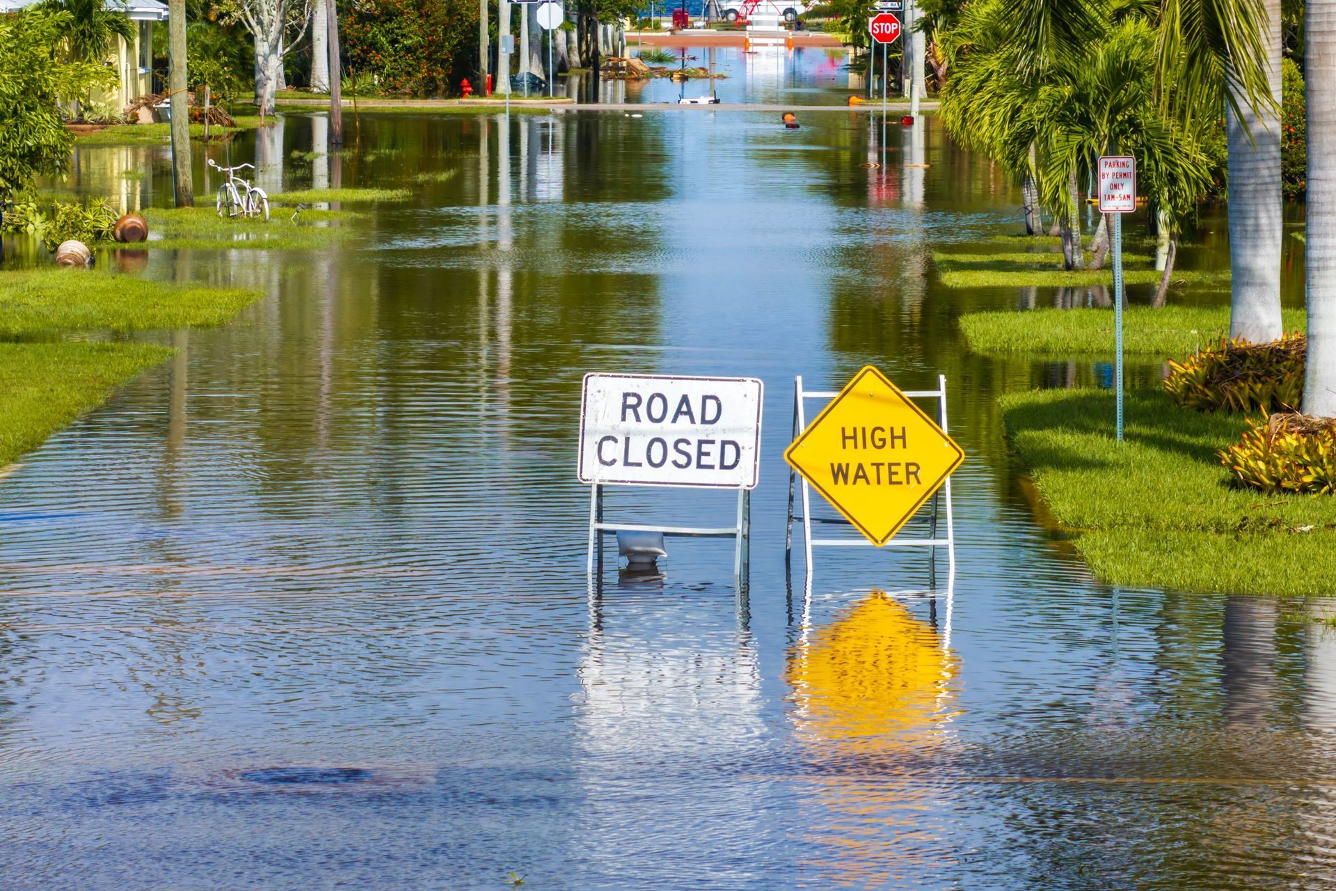 A flooded residential street with