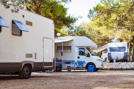 Couple of RVs Parked in a Campground