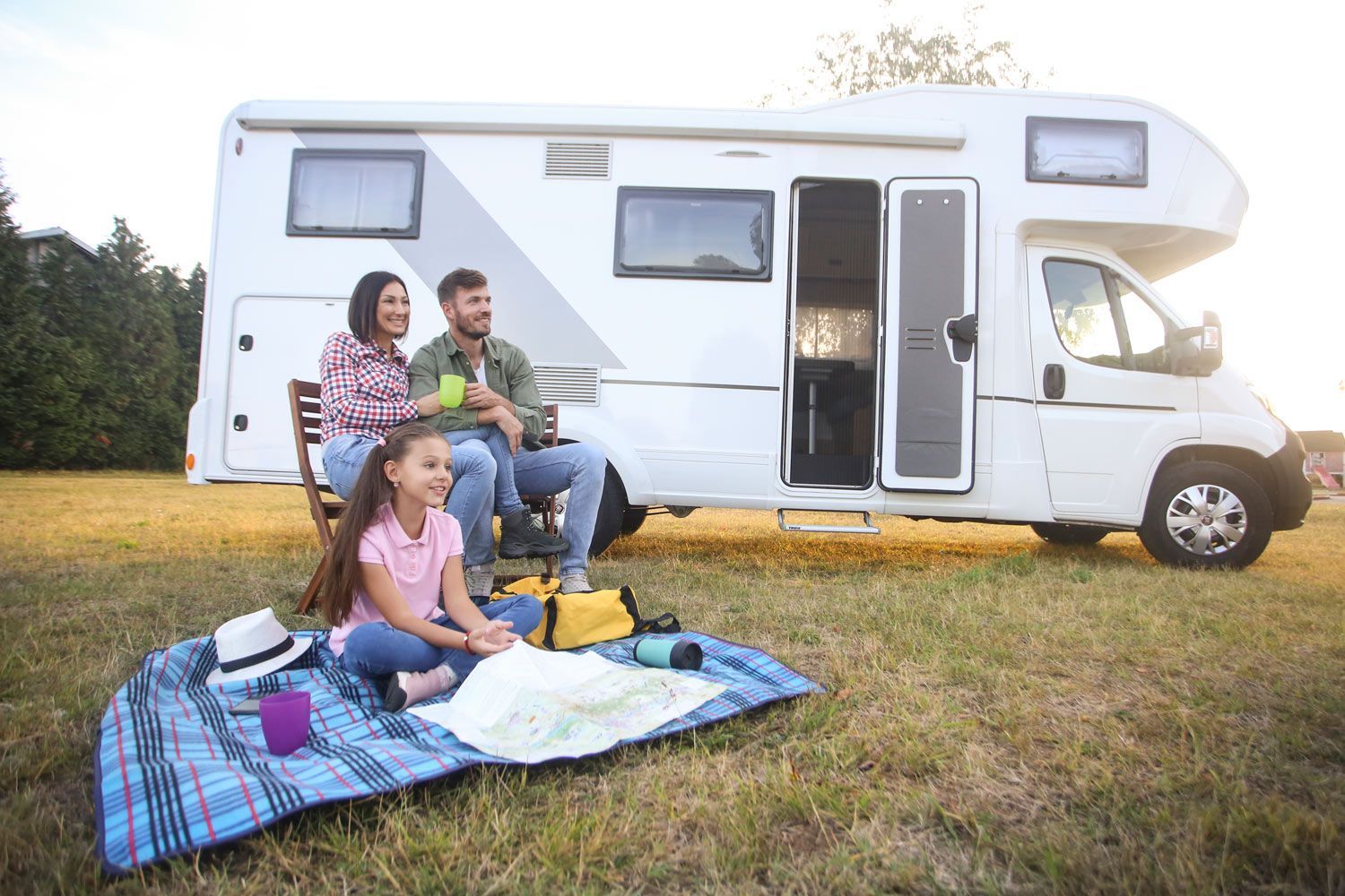 A Family is Enjoying their Picnic in Park A Family is Enjoying their Picnic in Park