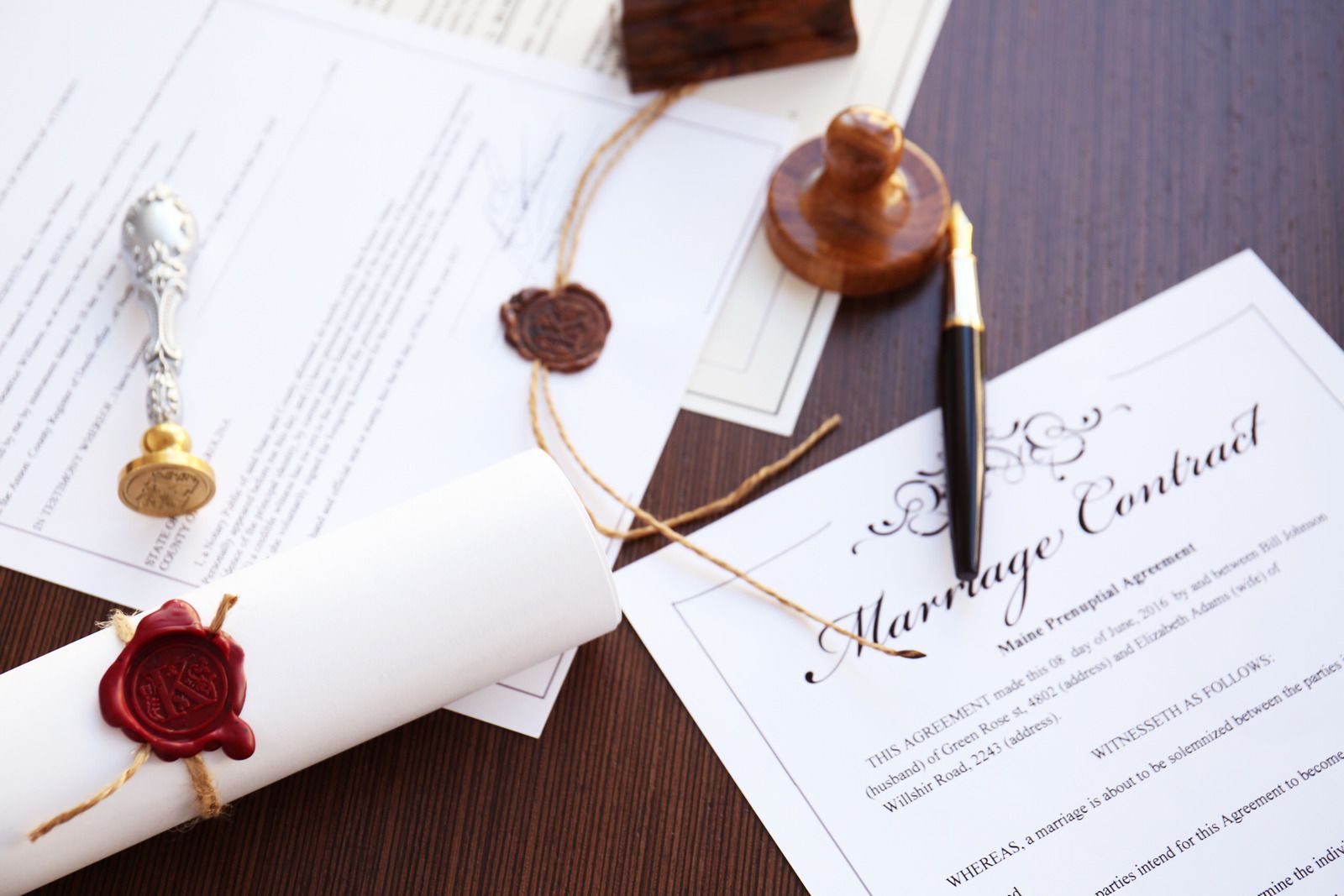 A marriage contract with a wax seal and a pen